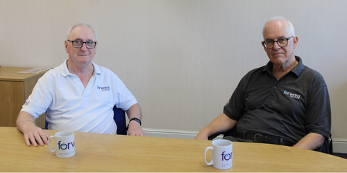 Technology Company  celebrates Long-Serving Duo